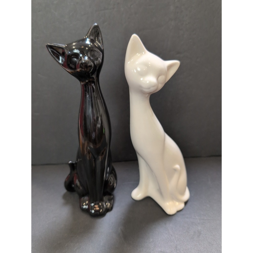 Pair of vintage mid-century modern Art Deco ceramic cat figurines. Black & White